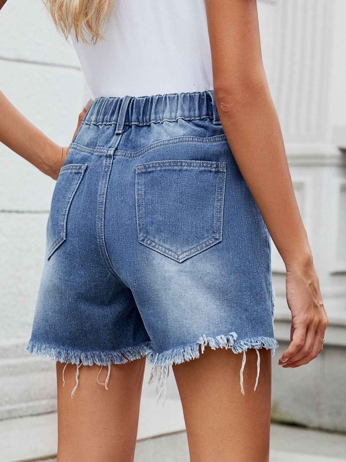 Distressed Raw Hem Asymmetrical Waist Denim Shorts