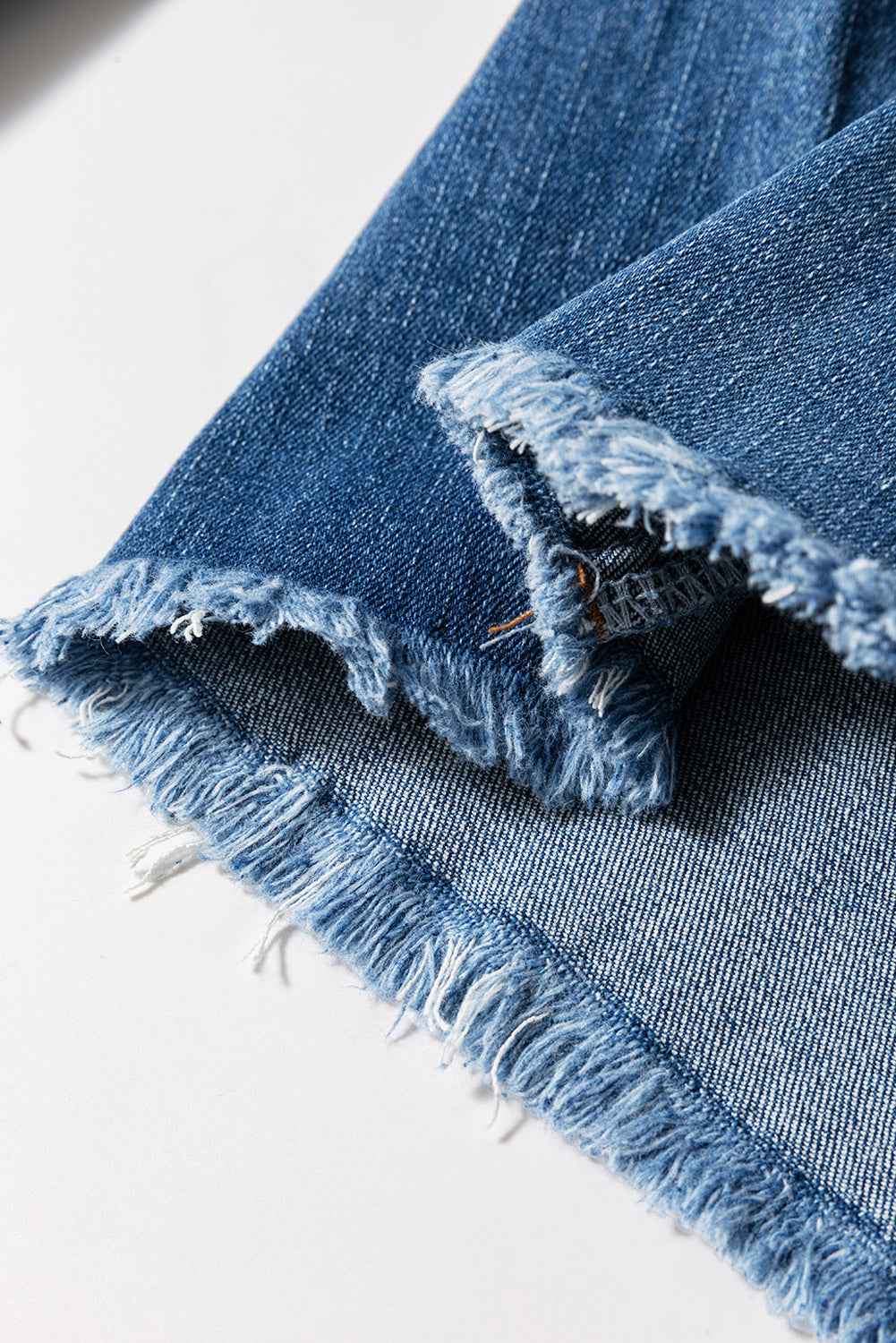 Sail Blue High Waist Jeans With Button Fly And Raw Hem