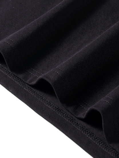 Close-up of the hem stitching on the Hello Kitty Pink Bow Black Graphic Women's T-shirt, highlighting the quality cotton fabric and neat finish.