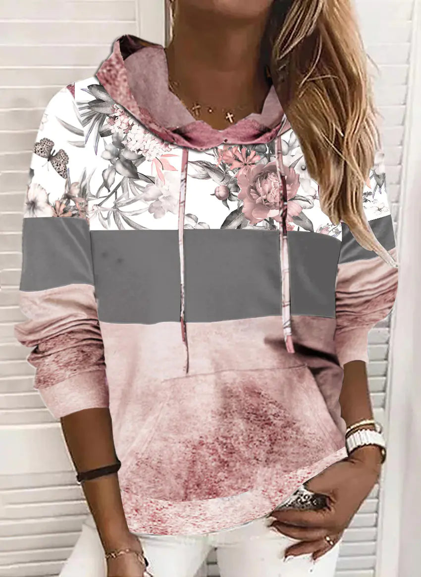 Trendy Hooded Printed Fleece Sweatshirt in soft pink and grey hues with floral accents, perfect for gifting or everyday fashion wear.
