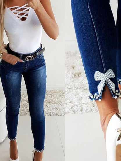 Skinny Split Hem with Floral Flair Women's Jeans