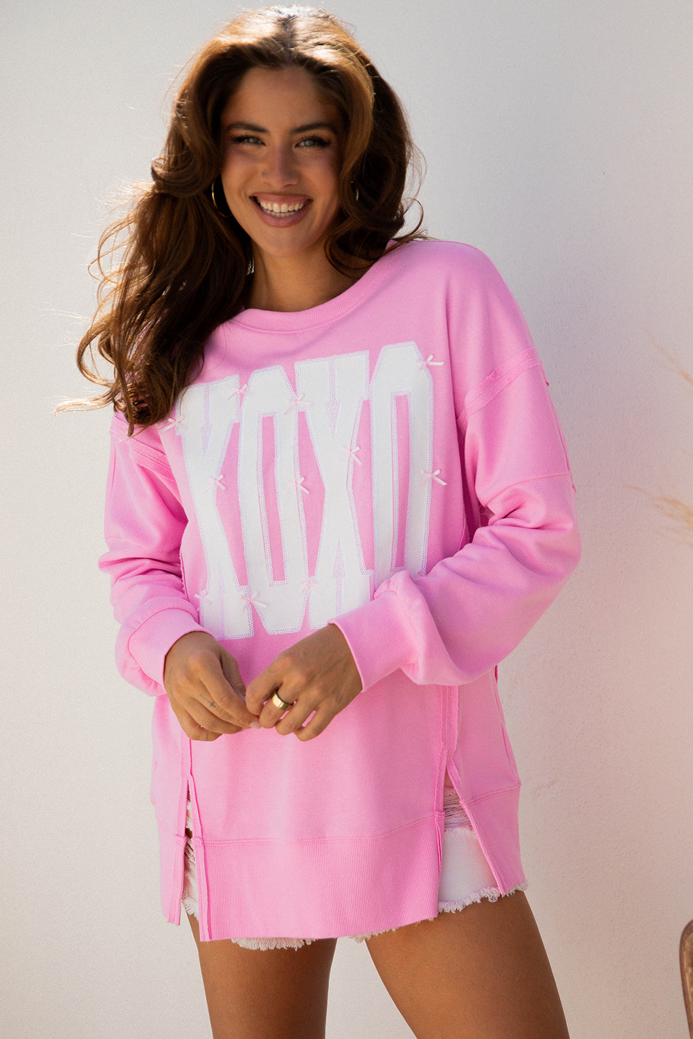 Valentine's XOXO Sequin Bow Exposed Seam Sweatshirt