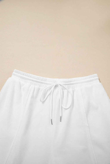 Plus Size Solid Raw Seam Top and Drawstring Pants Set