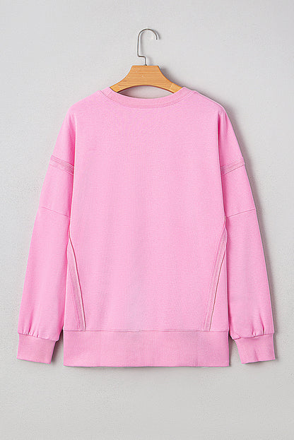 Valentine's XOXO Sequin Bow Exposed Seam Sweatshirt